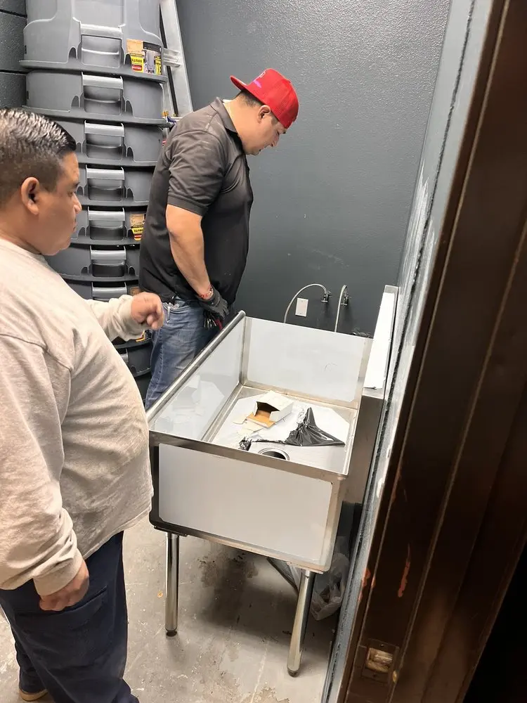 Commercial plumbing and sink installation in Luling